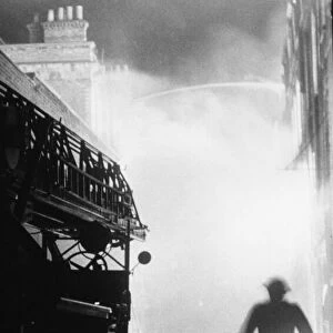 Firemen fighting fires at Britannia Row, Clerkenwell, London