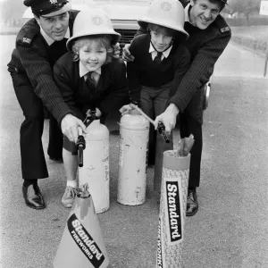 Firemen Geoff Sykes (left) and Mick Senior spell out a Bonfire Night fire safety message Firemen Geoff Sykes (left) and Mick Senior spell out a Bonfire Night fire safety message