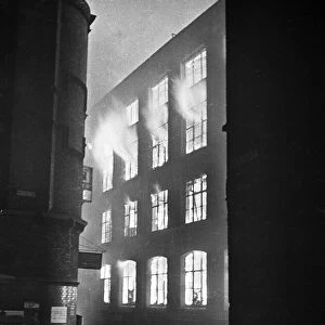Fires caused by the dropping of thousands of incendiary bombs by the Luftwaffe