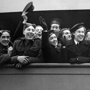 Their first day on a Troopship, soldiers waving goodbye