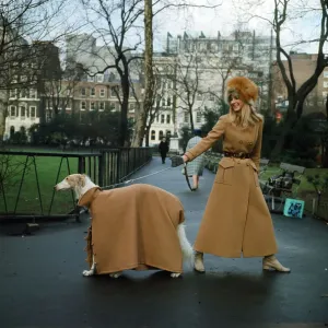 The first maxi coat for dogs gets its maiden outing in London with model Vicki Hodge The first maxi coat for dogs gets its maiden outing in London with model Vicki Hodge