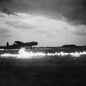 A photograph print of an RAF Lancaster bomber taking off amidst dispersed fog A photograph print of an RAF Lancaster bomber taking off amidst dispersed fog