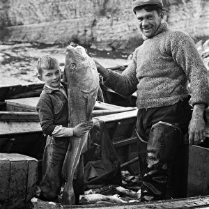 Fisherman George Emmerson pictured at work in Flamborough. 30th October 1960