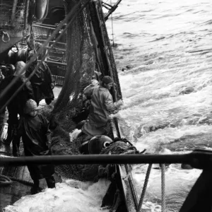 Fishing trawler out at sea in heavy weather Fishing trawler out at sea in heavy weather