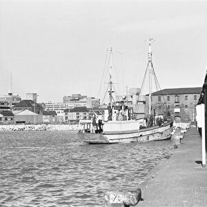 The fishing vessel William McCann seen here mooring in a deserted Humber Dock Marina
