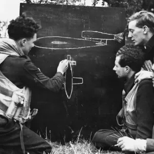 Flight Sergeant M. Rose Teaches Flying Bomb Techniques Print