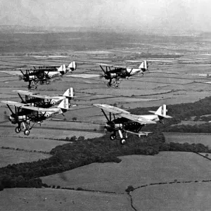Two flights of Armstrong Whitworth Siskin fighter aircraft Two flights of Armstrong Whitworth Siskin fighter aircraft