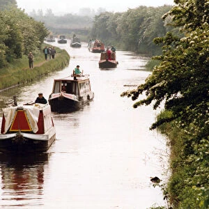 A flotilla of barges winds their way through the waterways of Aintree and Bootle