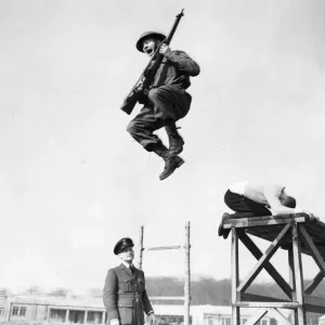 A flying leap before the instructor during the battle agility training demonstration of A flying leap before the instructor during the battle agility training demonstration of