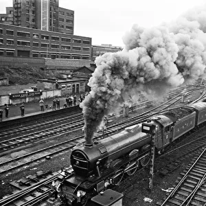 The Flying Scotsman leaving Kings Cross for the very last time. It travels to Edinburgh