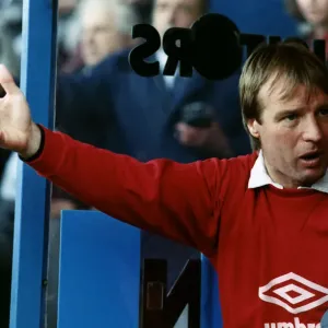 Football manager of Sheffield United Dave Bassett talks with his coach in the dug out Football manager of Sheffield United Dave Bassett talks with his coach in the dug out