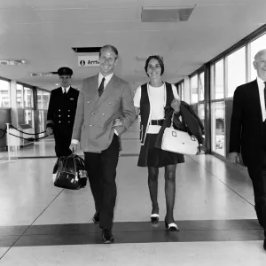 Print of Bobby Charlton and Norma leaving Heathrow for Australia