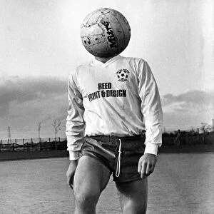 Footballer juggling a football, circa 1987