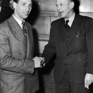 Footballer Tommy Lawton (left) shakes hands with his new manager Arthur Stollery after Footballer Tommy Lawton (left) shakes hands with his new manager Arthur Stollery after