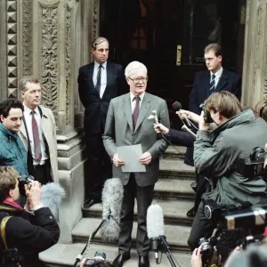 Foreign Secretary Douglas Hurd on the steps on the Foreign Office announcing his