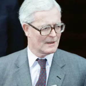 Foreign Secretary Douglas Hurd on the steps on the Foreign Office announcing his