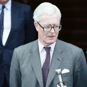 Foreign Secretary Douglas Hurd on the steps on the Foreign Office announcing his