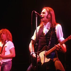 Francis Rossi playing at the Hammersmiths Odeon with his band Status Quo