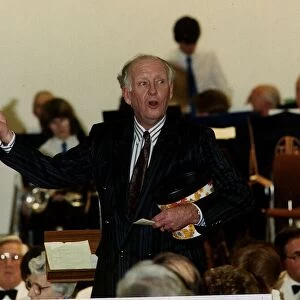 Frank Bough TV presenter drawing the raffle at a charity dinner