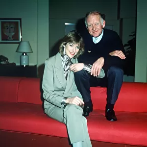 Frank Bough TV Presenter sitting with Selina Scott Circa 1985