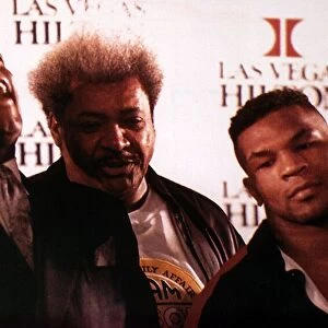 Frank Bruno Mike Tyson boxers with promotor Don King at a press conference
