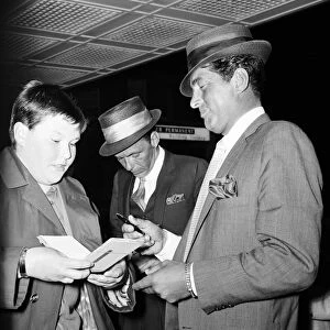Frank Sinatra and Dean Martin, arrive at London Heathrow Airport, from Los Angeles