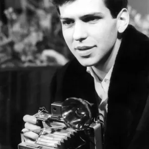 Frank Sinatra Junior son of Frank Sinatra with Polaroid camera