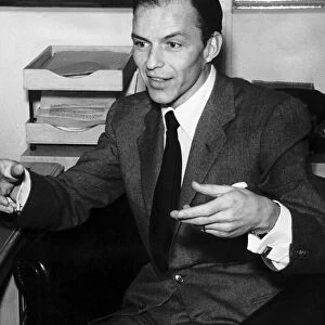 Frank Sinatra singer in his chair talking December 1951