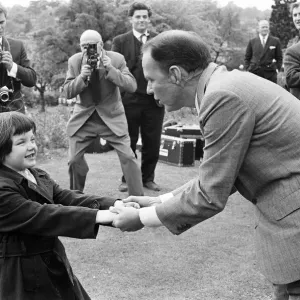 Frank Sinatra, visits the Sunshine Home for Blind Babies and Children at Northwood