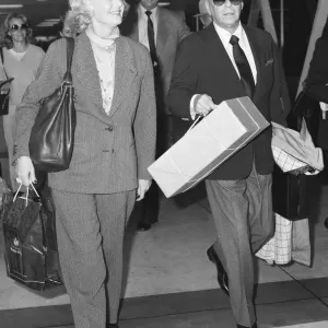 Frank Sinatra and wife Barbara Marx seen here departing Heathrow Airport
