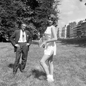 Fred Perry with actress Yvonne Buckingham, during a coaching session