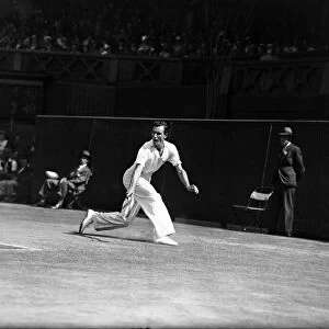 Fred Perry competing at Wimbledon Centre Court, during the final match of The 1934 Davis
