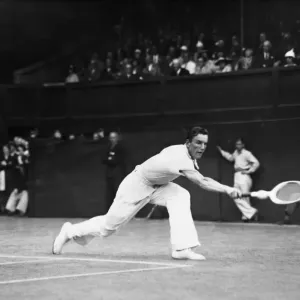 Fred Perry (GB) in action in the Wimbledon Mens Quarterfinals against George Lott (USA) Fred Perry (GB) in action in the Wimbledon Mens Quarterfinals against George Lott (USA)