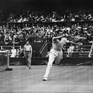 Fred Perry (pictured) (GB) competing at The Wimbledon Tennis Championships against Gerry Fred Perry (pictured) (GB) competing at The Wimbledon Tennis Championships against Gerry