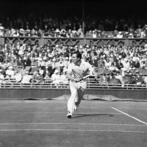Fred Perry plays a back hand pass on The Centre Court at The Mens Wimbledon Tennis Fred Perry plays a back hand pass on The Centre Court at The Mens Wimbledon Tennis