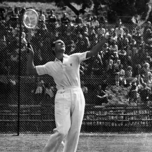 Fred Perry Tennis player demonstrates the service play during his exhibition at Cardiff Fred Perry Tennis player demonstrates the service play during his exhibition at Cardiff