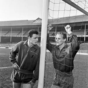 Fred Pickering and Alex Young (right) in the goalmouth at Everton FC after training