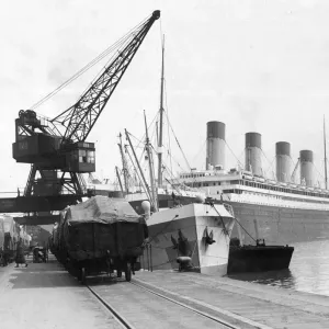 Freight being loaded onto Ocean Liner from train. c. 1950 English Railways Freight being loaded onto Ocean Liner from train. c. 1950 English Railways
