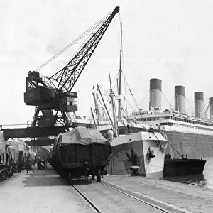 Freight being loaded onto Ocean Liner from train. c. 1950 English Railways