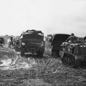 French refugees from the Verson area are seen on the Cheux-Colleville road French refugees from the Verson area are seen on the Cheux-Colleville road