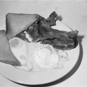 Fried Eggs, Fried Bacon and Fried Bread on a plate. Picture taken 9th August