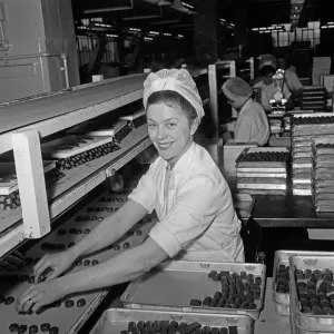 Frys Chocolate factory at Keynsham. Packing chocolates Mrs Ilene Sommhill of St