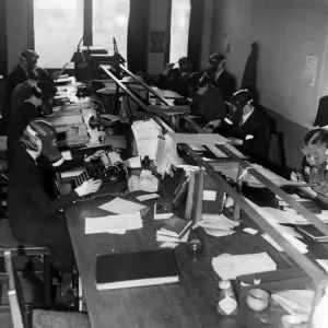 Fulham Council employees at the Town Hall having to wear gas masks whilst performing