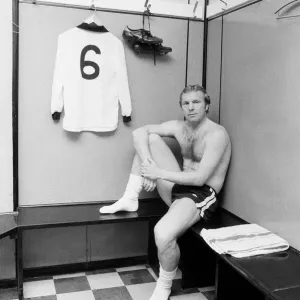 Fulham footballer Bobby Moore sits alone in the dressing room at Craven Cottage with his Fulham footballer Bobby Moore sits alone in the dressing room at Craven Cottage with his