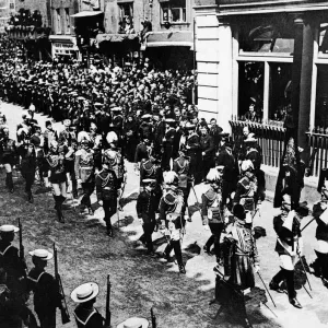 Funeral ceremony of King Edward VII in London showing crowds lined on the streets as