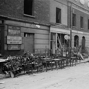 Furniture stacked on the street outside a cafe in SE1