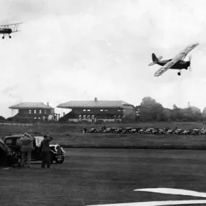 G. E. Lowdell flying in a Comper Swift (G-ABTC) leads Sq Ldr J. W G. E. Lowdell flying in a Comper Swift (G-ABTC) leads Sq Ldr J. W