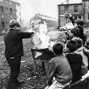 A gang of children risks injury playing with fire on wasteland at Beaumont Street