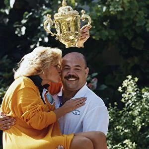 Gareth Chilcott lifting Alison Holloway his co presenter for the Rugby Union World Cup