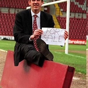 Gary Mackay Hearts footballer holding For Sale sign